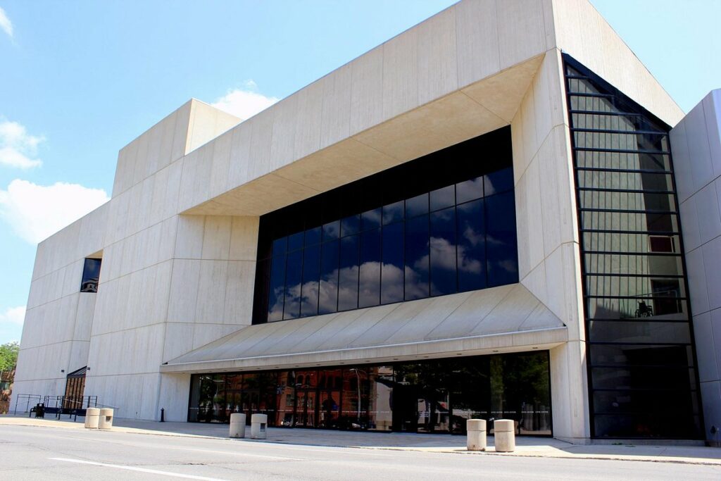 Exterior shot of the Des Moines Civic Center, featuring its distinctive design and grand entrance, symbolizing a hub for arts, culture, and entertainment in the heart of the city.